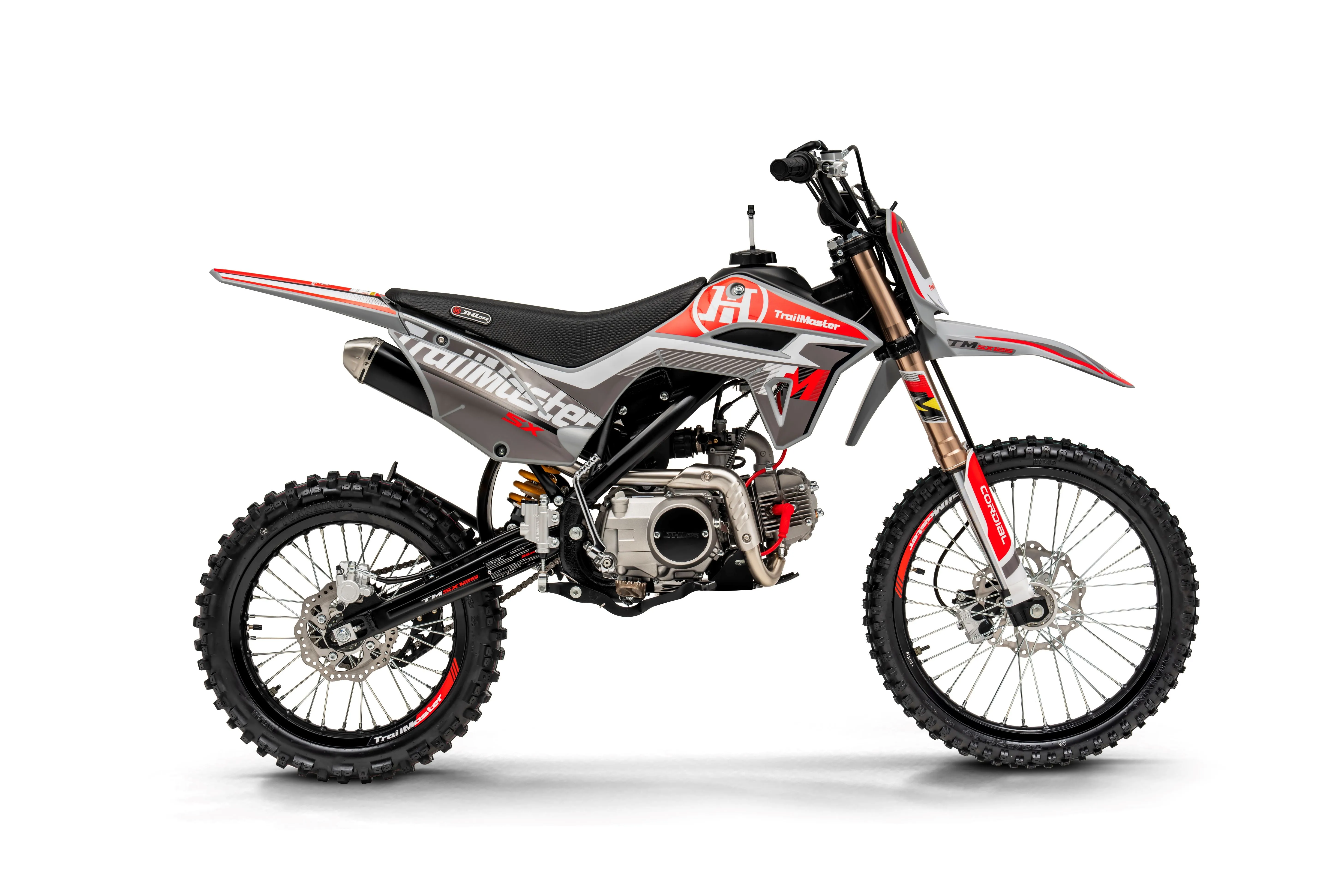 Trailmaster SX125 Dirt Bike, 4 speed manual trans, Air Cooled, Stainless Exhaust, Electric Start, 19 inch front tire, 32.70 inch seat height, Water Proof Wiring Harness