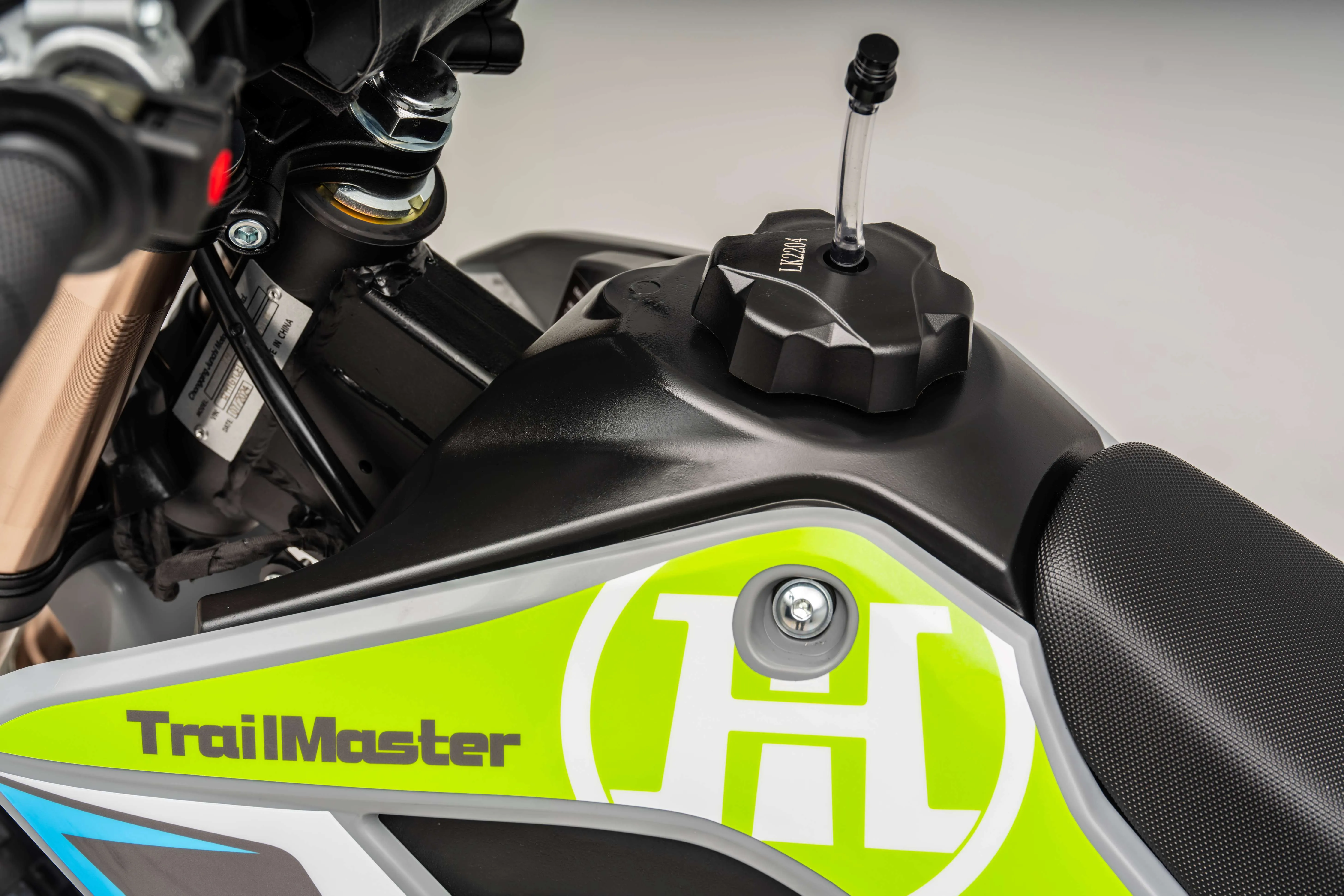 Trailmaster SX125 Dirt Bike, 4 speed manual trans, Air Cooled, Stainless Exhaust, Electric Start, 19 inch front tire, 32.70 inch seat height, Water Proof Wiring Harness